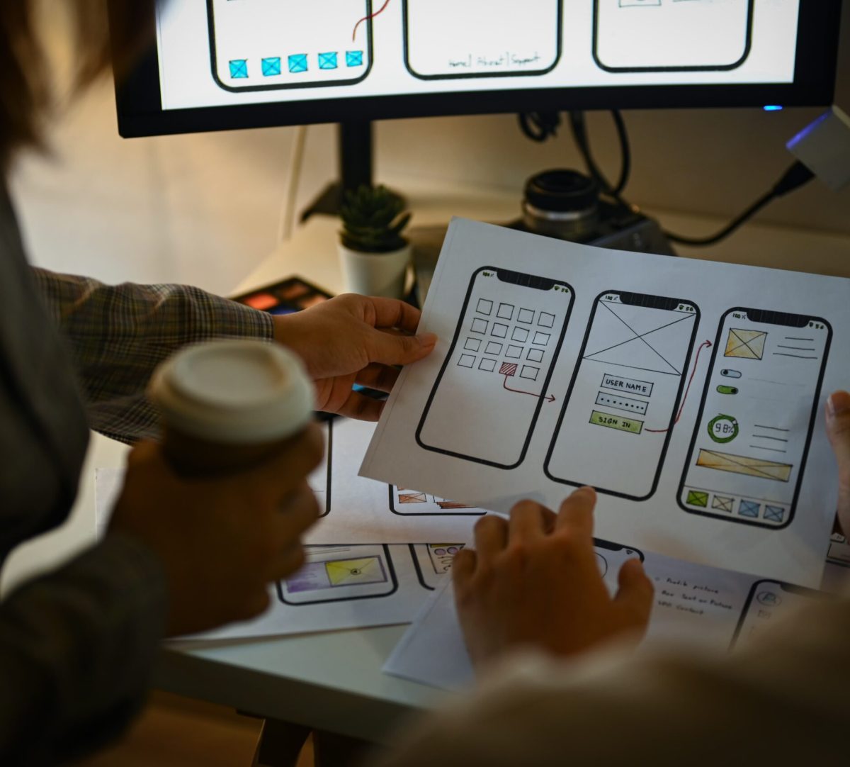 Creative designer team working with template layout framework mobile phone application min